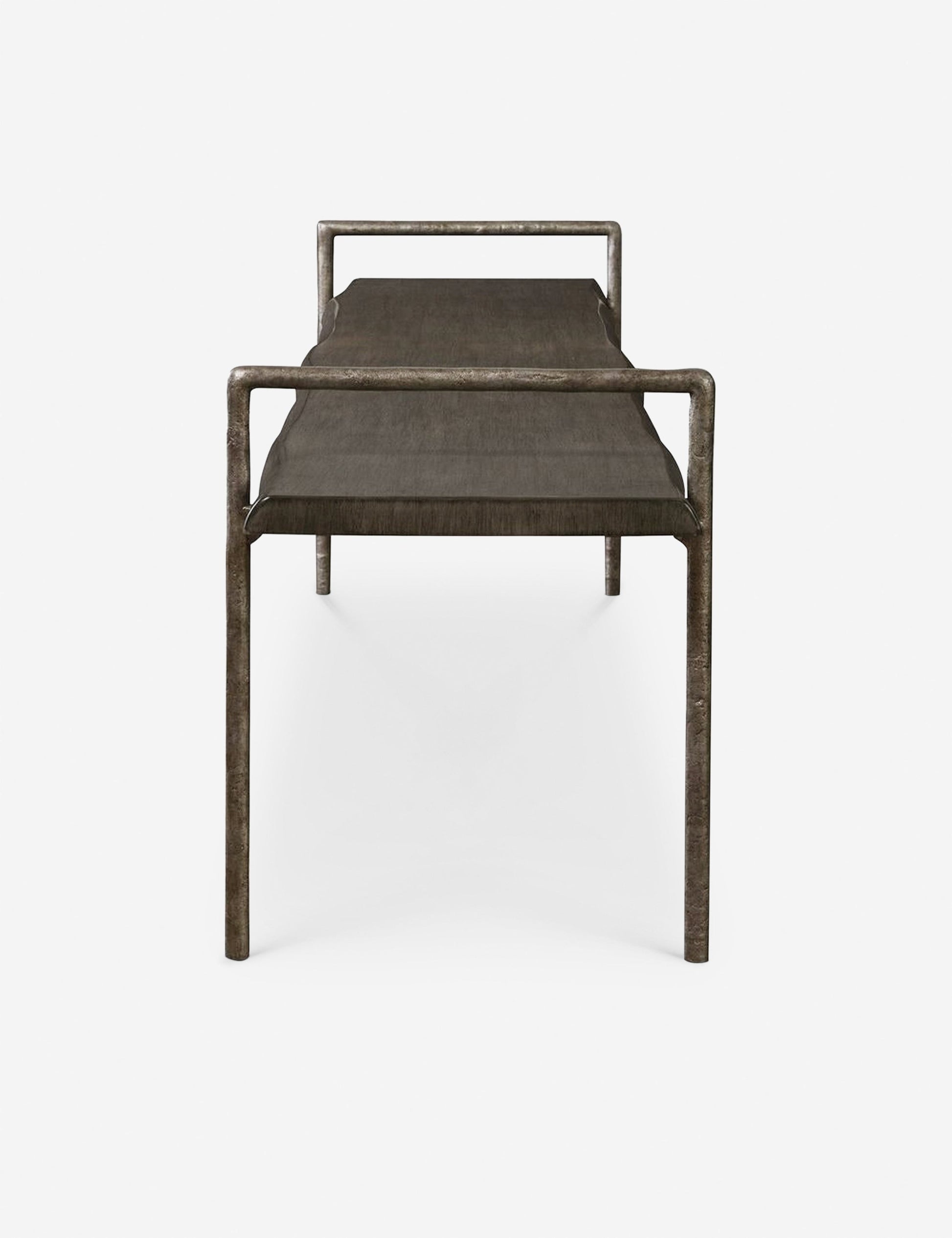 | Side profile of the Indrani sleek wooden bench with iron frame.
