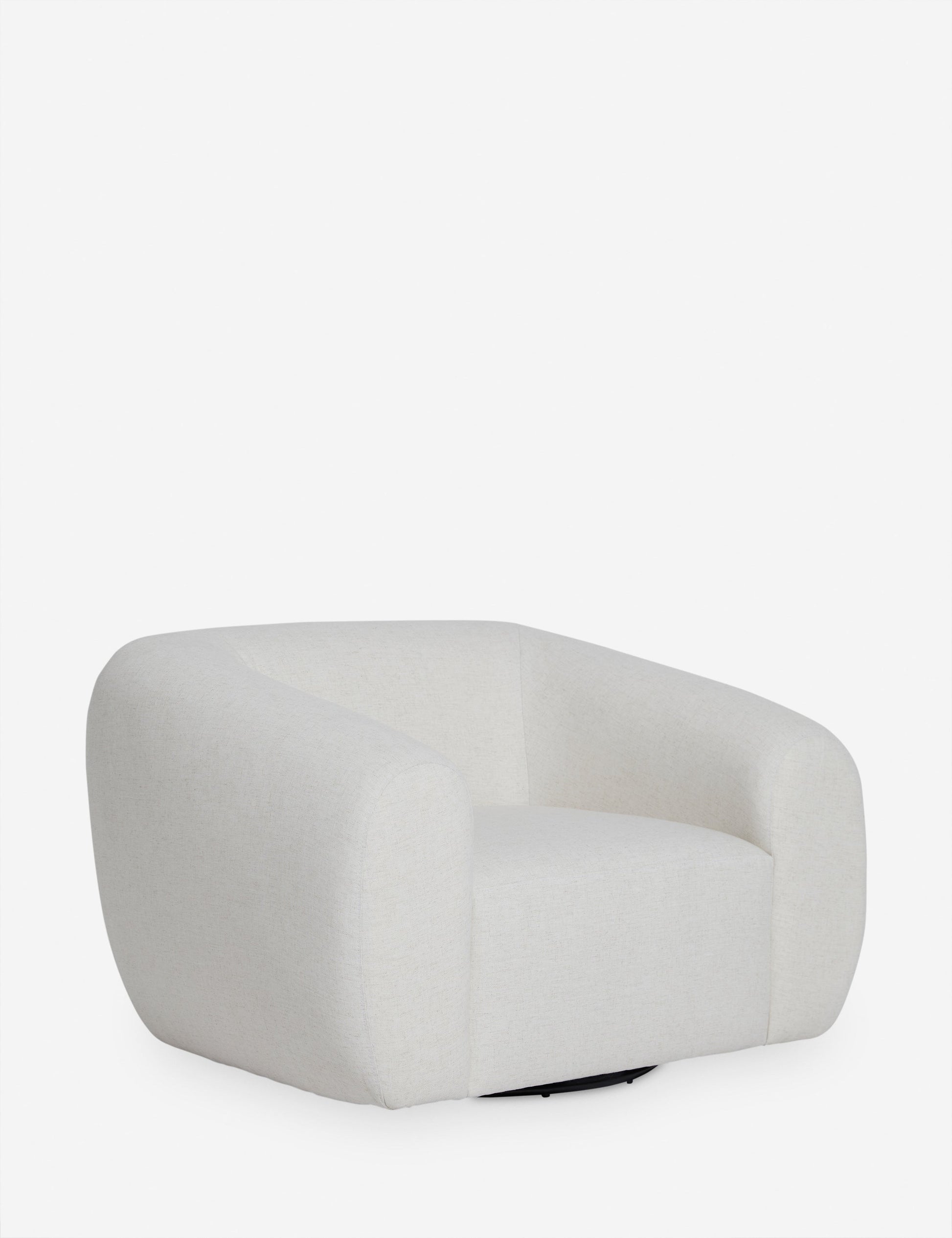 | Angled view of the Harlowe softly sculpted plush swivel accent chair.