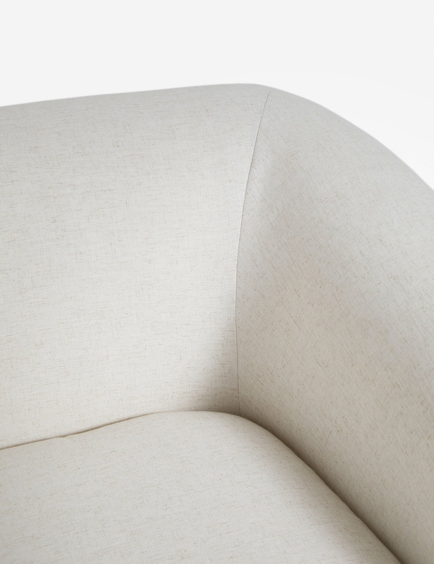| Close up view of the Harlowe softly sculpted plush swivel accent chair.