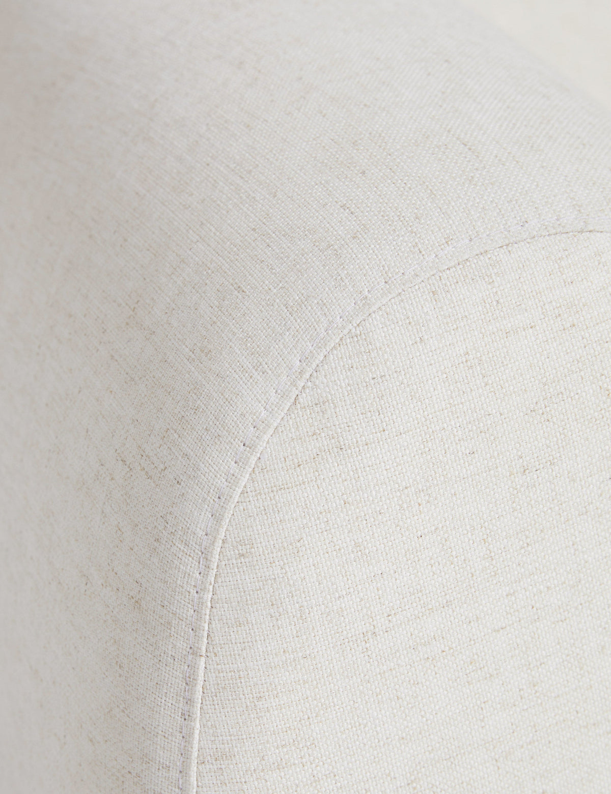 | Close up view of the Harlowe softly sculpted plush swivel accent chair.