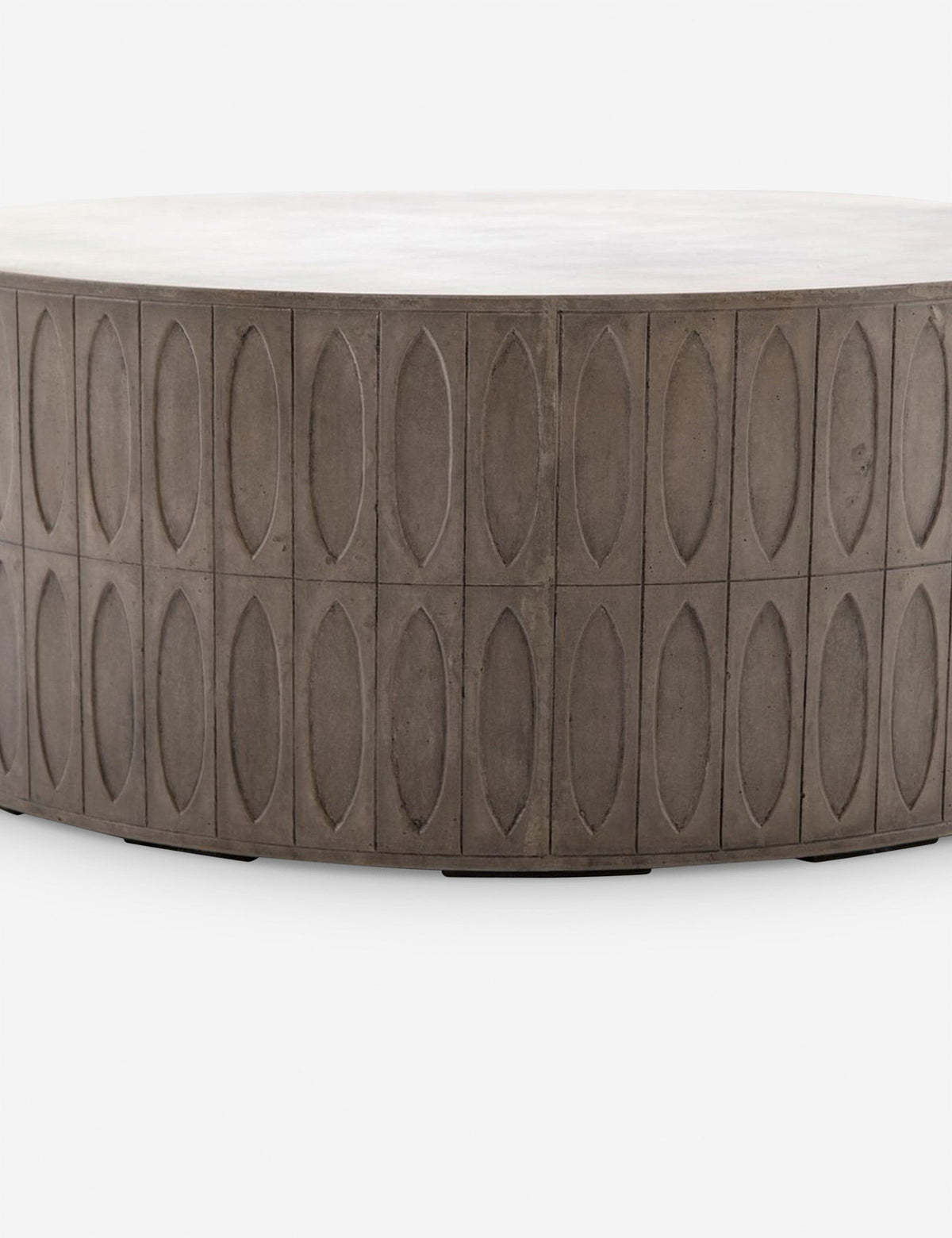 | Close-up of the accented side on the Mal concrete indoor and outdoor round coffee table