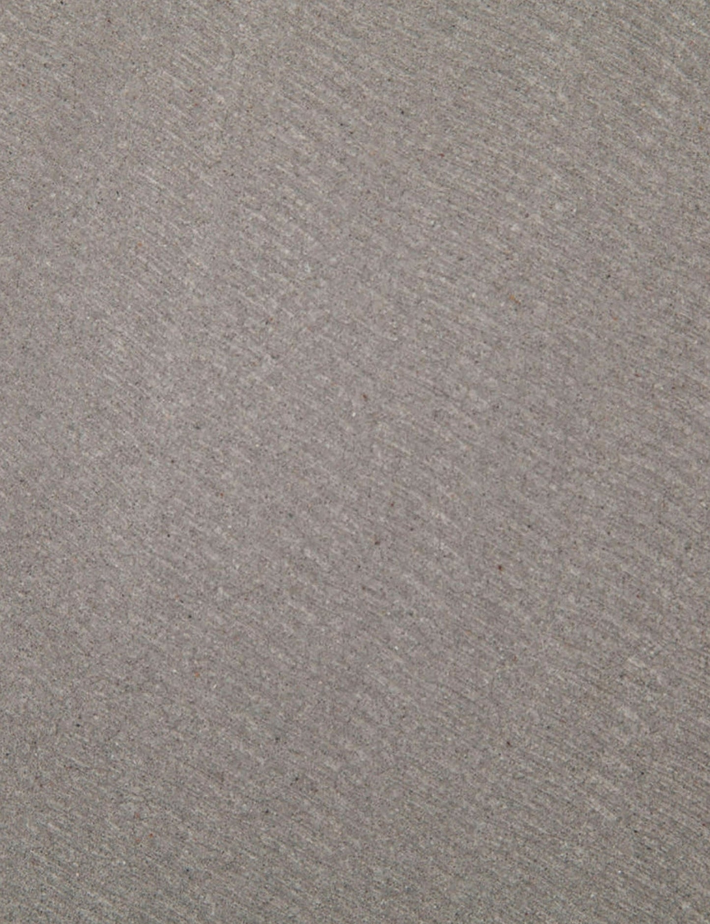 | Detailed view of the lavastone material on the surface of the Agatha indoor and outdoor dining table with black iron base