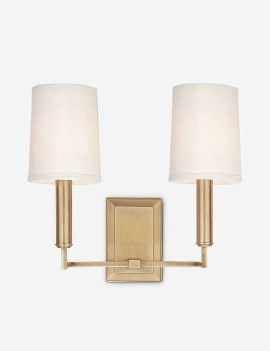 #color::brass | Charlie brass double sconce with parchment shades and angular arms