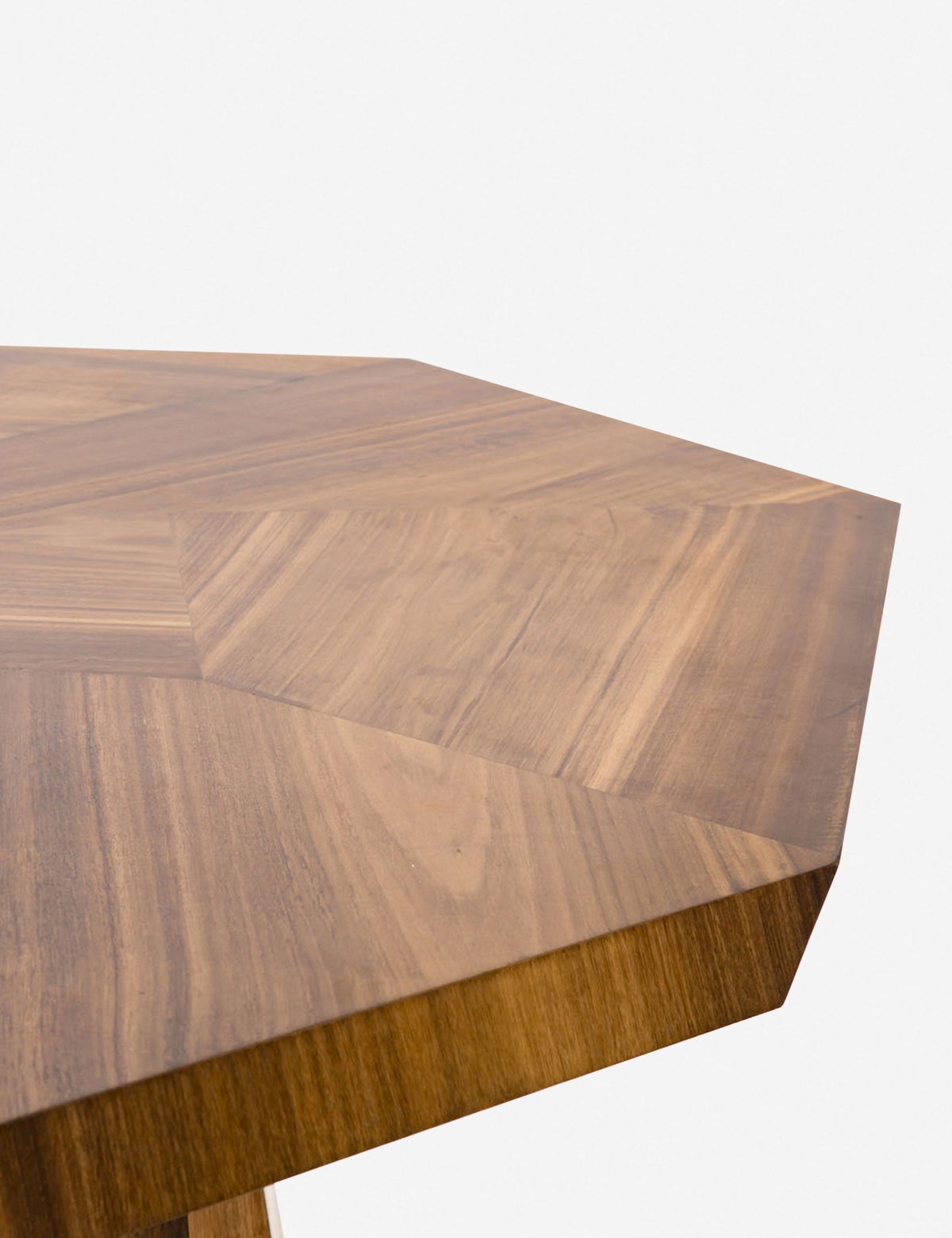 | The beveled edge on the side of the Herschel dining table