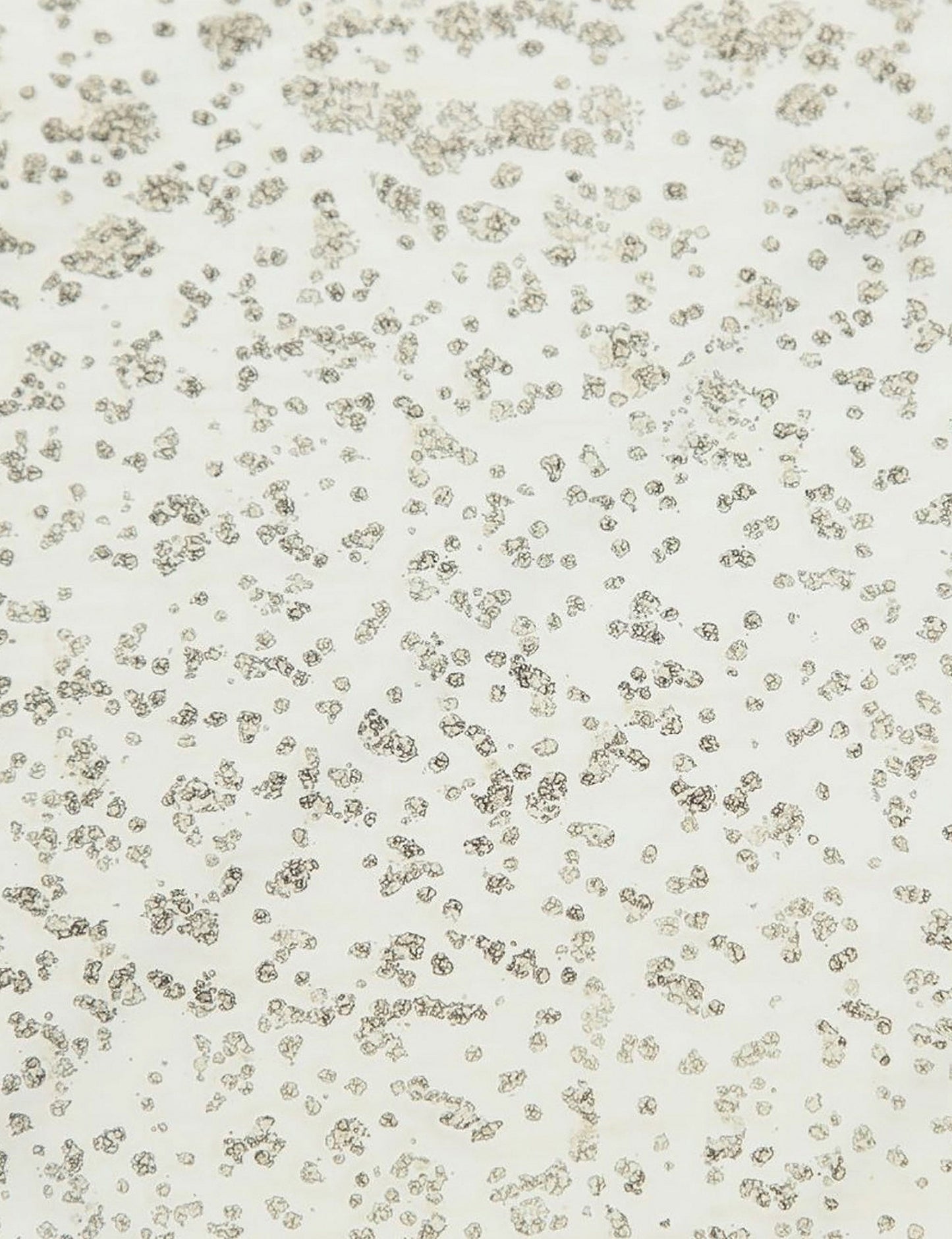 | Detailed view of the texture of the mirror ash glass top on the Bridget bronze pedestal side table
