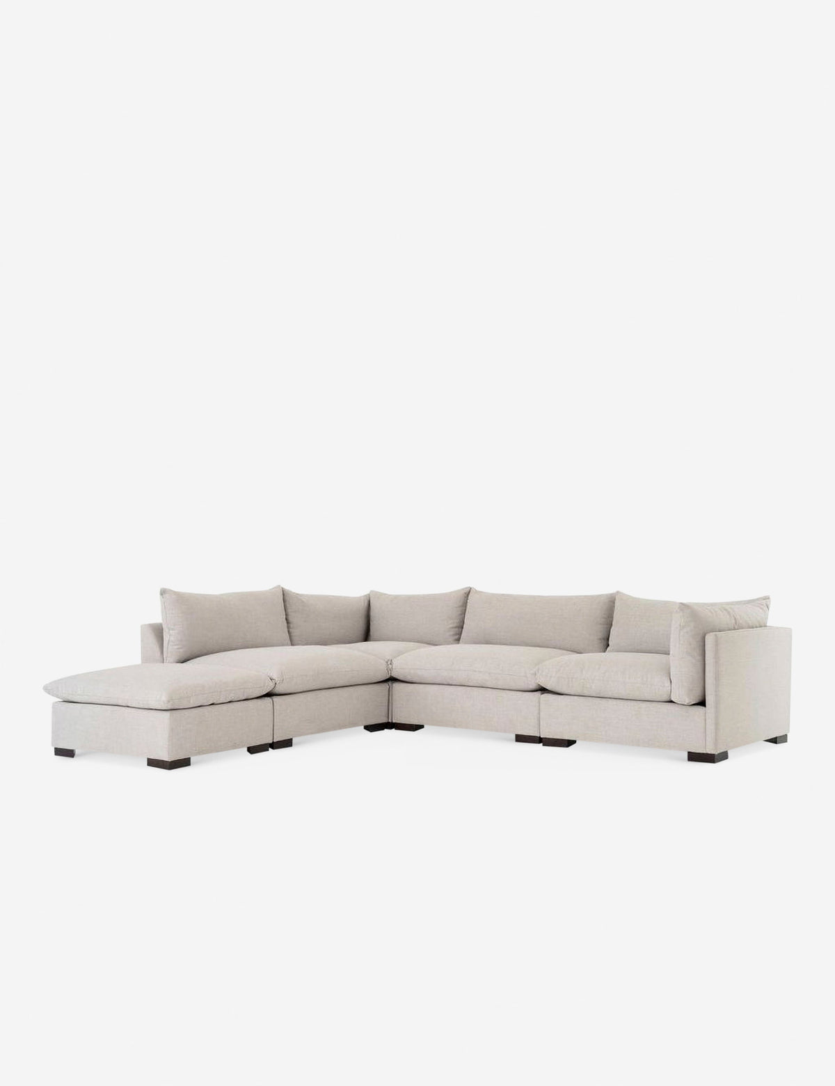 | Angled view of the Mitzi gray linen modular sectional sofa