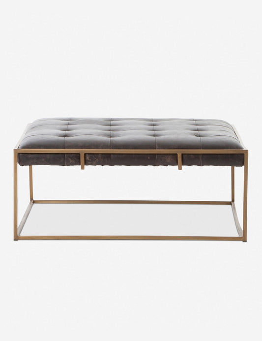 | Olwina Square Black Leather Coffee Table with a tufted finish and a brass-tone metal frame