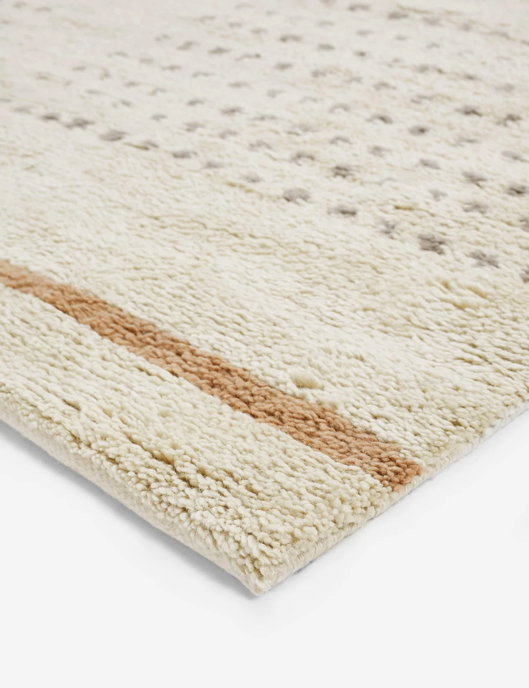 #size::6--x-9- #size::8--x-10- #size::9--x-12- #size::10--x-14- #size::12--x-15- | Close-up of the corner of the Rina wool moroccan rug