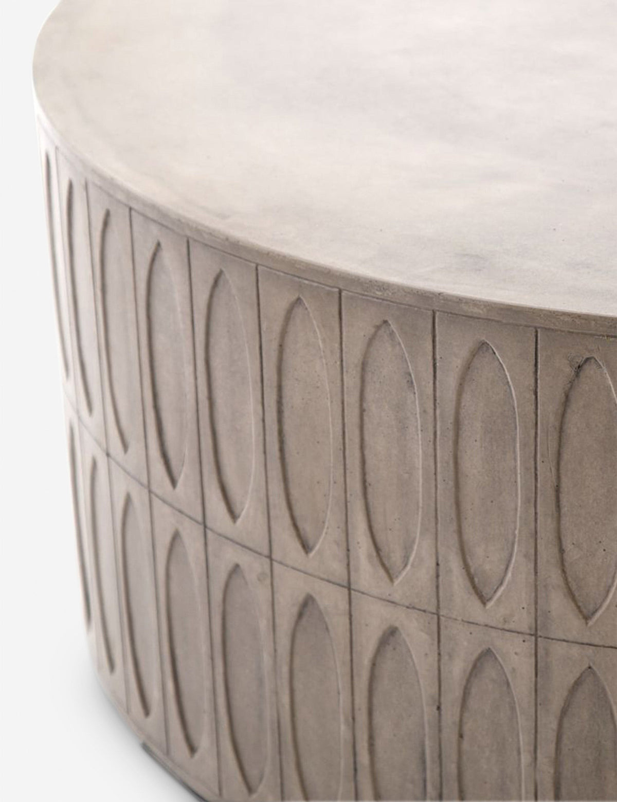 | Close-up of the accented side on the Mal concrete indoor and outdoor round coffee table