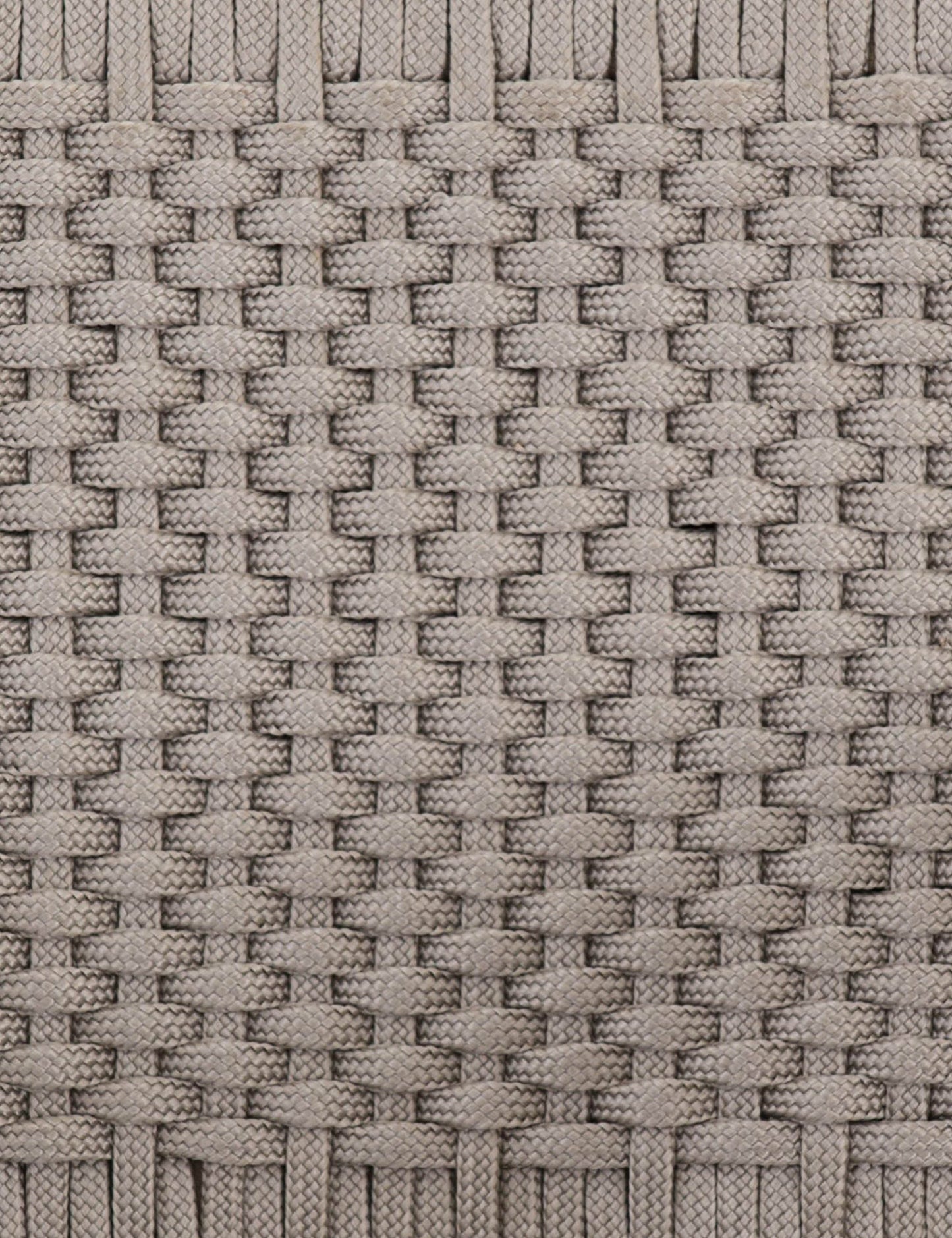 | The braided construction of the Ylva Natural Indoor / Outdoor Accent Chair